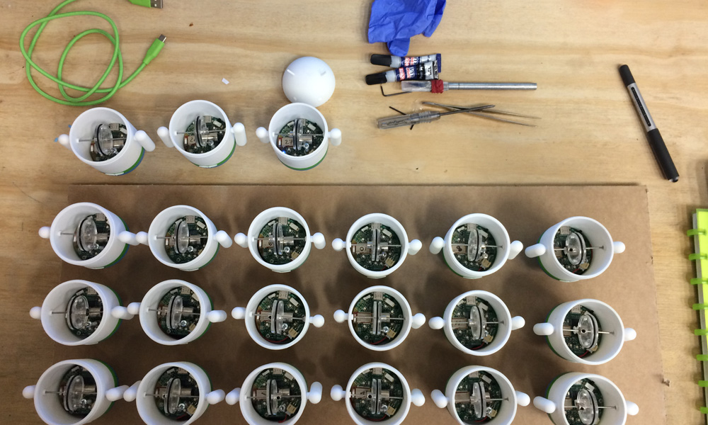 Top view of Bezzie robots during assembly